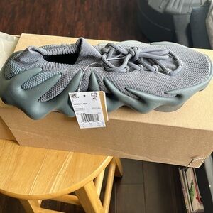 Brand new pair of Yeezy 450 utility stone grey.  Size 10 perfect for 9.5 men